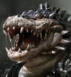 Close-up of a snarling dragon-like monster with sharp teeth and spiked scales on its head.
